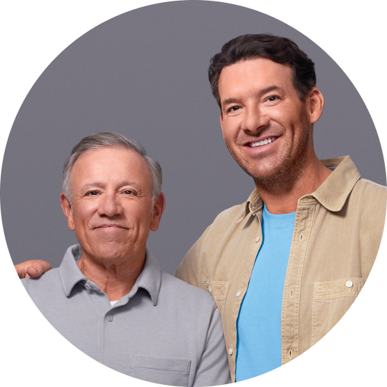 Image of Tony Romo and his Father Ramiro smiling 